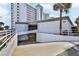 Entrance to condo parking garage, showcasing convenience and accessibility at 1155 Ocean Shore Blvd # 702, Ormond Beach, FL 32176