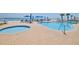 Beautiful pool and hot tub with brick paver decking, perfect for seaside relaxation at 1155 Ocean Shore Blvd # 702, Ormond Beach, FL 32176