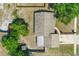 Bird's-eye view of the property, including the roof, backyard features, and surrounding landscape at 1197 Stillwood Ct, Port Orange, FL 32129