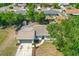 Aerial view of a home showcasing its backyard, mature trees, and surrounding neighborhood at 1197 Stillwood Ct, Port Orange, FL 32129
