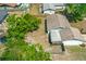 Overhead view of the property, its backyard, and neighboring houses within a fenced-in area at 1197 Stillwood Ct, Port Orange, FL 32129