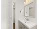 A bathroom with walk-in closet and vanity at 1197 Stillwood Ct, Port Orange, FL 32129