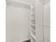 Organized walk-in closet with shelving at 1197 Stillwood Ct, Port Orange, FL 32129