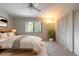 Serene bedroom featuring a large window, natural light, and a spacious closet at 140 Limewood Pl # 2, Ormond Beach, FL 32174