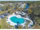 A bird's eye view of the community pool and surrounding area, ideal for residents to relax and socialize at 140 Limewood Pl # 2, Ormond Beach, FL 32174