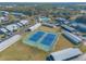 Aerial view of the community tennis courts, perfect for friendly matches and staying active at 140 Limewood Pl # 2, Ormond Beach, FL 32174