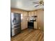Cozy kitchen featuring stainless steel appliances and wood countertops at 212 Rue De Pont, Tavares, FL 32778