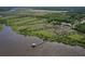The property includes a dock and a natural shoreline at 2189 Old Dixie Hwy, Ormond Beach, FL 32174