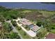 This waterfront estate offers a pool, multi-car garage and beautiful landscaping at 2189 Old Dixie Hwy, Ormond Beach, FL 32174