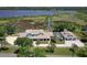 Gorgeous property boasts a well-maintained home, screened-in pool, and detached garage at 2189 Old Dixie Hwy, Ormond Beach, FL 32174