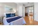 Comfortable bedroom decorated with neutral walls and blue accents at 2189 Old Dixie Hwy, Ormond Beach, FL 32174