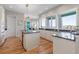 Kitchen featuring a center island, granite countertops, lots of natural light, and stainless steel appliances at 2189 Old Dixie Hwy, Ormond Beach, FL 32174