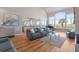 Open concept living room with a piano and beautiful views at 2189 Old Dixie Hwy, Ormond Beach, FL 32174