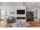 Bright living room with fireplace, shelving and views of the staircase at 2189 Old Dixie Hwy, Ormond Beach, FL 32174