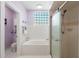Bathroom featuring a shower, soaking tub, and tiled floors at 27 Winding Creek Way, Ormond Beach, FL 32174