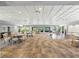 Spacious event space with ample seating, natural light, and a dance floor at 27 Winding Creek Way, Ormond Beach, FL 32174
