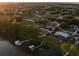 An aerial view of the beautiful waterfront home and its community at 3130 Indian Trl, Eustis, FL 32726