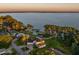 Beautiful waterfront home with a private dock and lush, mature landscaping at 3130 Indian Trl, Eustis, FL 32726