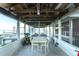 This waterfront home has a large covered dock with seating, boat lift, and access to the water at 3130 Indian Trl, Eustis, FL 32726