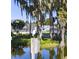 This condo complex boasts lush landscaping and a serene pond, home to beautiful wildlife, creating a peaceful retreat at 3130 Indian Trl, Eustis, FL 32726