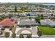 Charming single-story home with a well-manicured lawn, lovely light-blue paint, and a spacious driveway at 324 Plaza Blvd, Daytona Beach, FL 32118