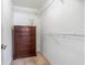 Walk-in closet space provides ample storage solutions with shelves, rods, and drawers at 324 Plaza Blvd, Daytona Beach, FL 32118