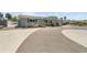 Well-maintained single-story home with a spacious driveway, lovely landscaping, and an attached two-car garage at 324 Plaza Blvd, Daytona Beach, FL 32118