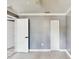 Bright and spacious bedroom features carpet, gray walls, and white doors at 330 Ponce Deleon Blvd, De Leon Springs, FL 32130
