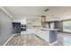 Modern kitchen featuring stainless steel appliances, white cabinetry, and ample counter space at 330 Ponce Deleon Blvd, De Leon Springs, FL 32130