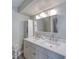 Bathroom featuring a double sink vanity, modern fixtures, and stylish lighting at 330 Wall Ave, Ormond Beach, FL 32174