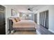Cozy bedroom featuring a ceiling fan, windows, and closet space at 330 Wall Ave, Ormond Beach, FL 32174