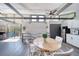 Inviting dining area with views to the outdoor deck and mini kitchen at 330 Wall Ave, Ormond Beach, FL 32174
