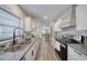 Modern kitchen showcasing countertops, stainless steel appliances, and an open layout at 330 Wall Ave, Ormond Beach, FL 32174