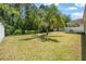 Large backyard with lush lawn provides space for outdoor activities and relaxation at 43 Pergola Pl, Ormond Beach, FL 32174