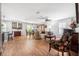 Open-concept living and dining area with wood floors and abundant natural light at 43 Pergola Pl, Ormond Beach, FL 32174