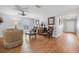 Cozy living area featuring beautiful wood flooring, neutral walls, and bright window at 43 Pergola Pl, Ormond Beach, FL 32174