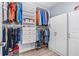 Organized walk-in closet with shelving, drawers, and hanging rods for ample storage at 5635 Estero Loop, Port Orange, FL 32128