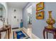 Inviting entryway with tile flooring, elegant decor, and a view into the living area at 5635 Estero Loop, Port Orange, FL 32128