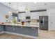 Modern kitchen with granite countertops, stainless steel appliances, and ample cabinet space at 5635 Estero Loop, Port Orange, FL 32128