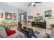 Cozy living room with tile floors, neutral paint, and an entertainment center at 5635 Estero Loop, Port Orange, FL 32128