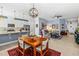 Open layout showcasing the dining area, living room, and kitchen with modern finishes at 5635 Estero Loop, Port Orange, FL 32128