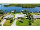 Beautiful waterfront home featuring well-manicured lawn space, lush landscaping and easy access to the canal at 5809 Riverside Dr, Port Orange, FL 32127