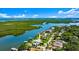 Waterfront home with private dock and pool overlooking a beautiful bay with boat access to the Gulf of Mexico at 5809 Riverside Dr, Port Orange, FL 32127