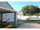 Spacious backyard featuring a trampoline, hammock, and well-maintained pavers at 8958 Fort Jefferson Blvd, Orlando, FL 32822
