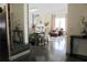 Spacious open-concept area with a dining table, living area with a leather sofa, and stylish furnishings at 8958 Fort Jefferson Blvd, Orlando, FL 32822