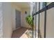 The front entryway with security gate and a small garden area at 200 Florida Shores Blvd, Daytona Beach, FL 32118