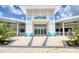 Charming clubhouse entrance with teal accents and a welcoming facade; ideal for gatherings and community events at 324 Coral Reef Way, Daytona Beach, FL 32124