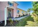 Charming home with mixed siding, well-maintained landscaping, and a welcoming front entry area at 324 Coral Reef Way, Daytona Beach, FL 32124