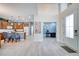 Bright foyer with tile floors, high ceilings, and a view into the kitchen and office space at 324 Coral Reef Way, Daytona Beach, FL 32124