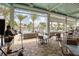 Outdoor dining area with views of the pool and landscaped grounds at 324 Coral Reef Way, Daytona Beach, FL 32124